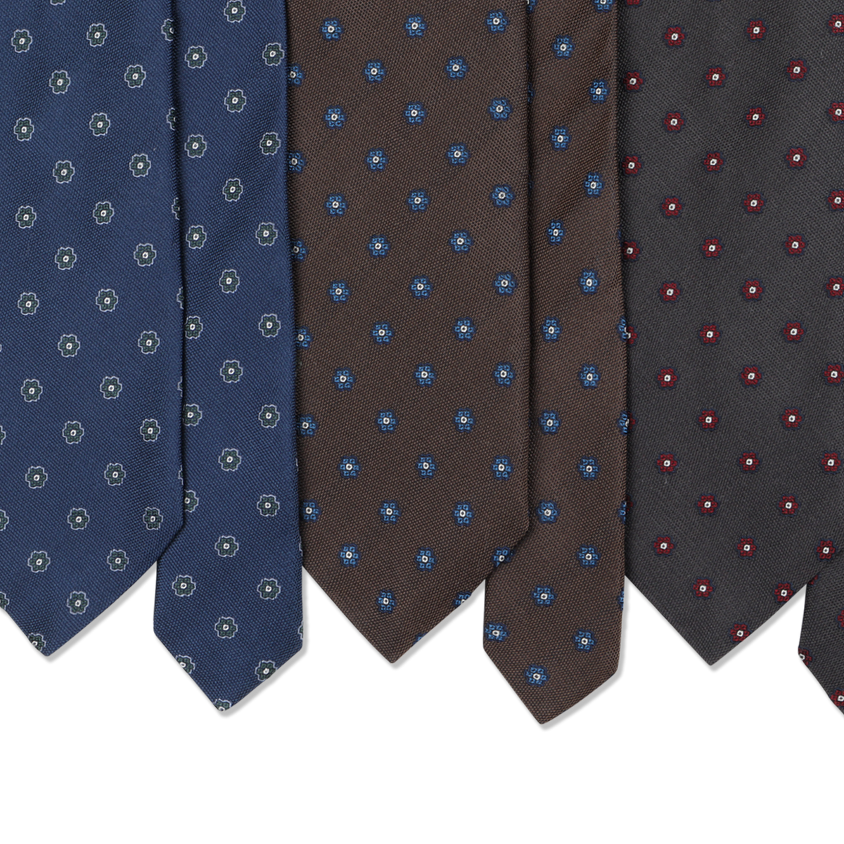 
                  
                    Red Motif Tie in Grey Cotton Silk
                  
                