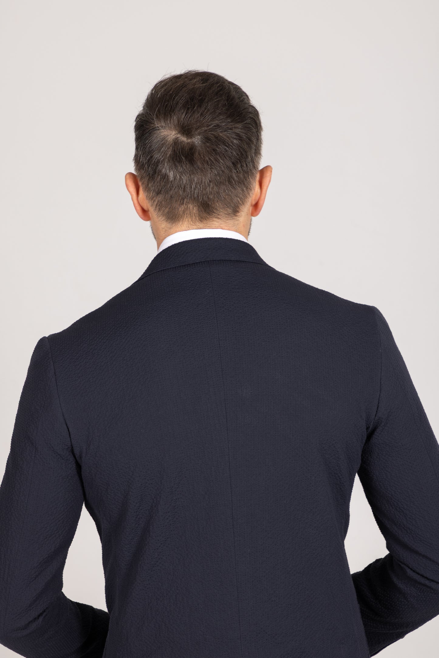 
                  
                    Single Breasted Notch Lapel Suit in Navy Seersucker
                  
                