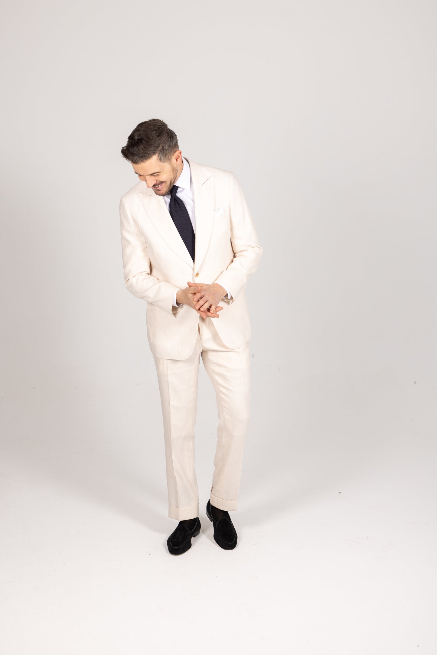 
                  
                    Single Breasted Peak Lapel Suit in Cream Wool Linen
                  
                
