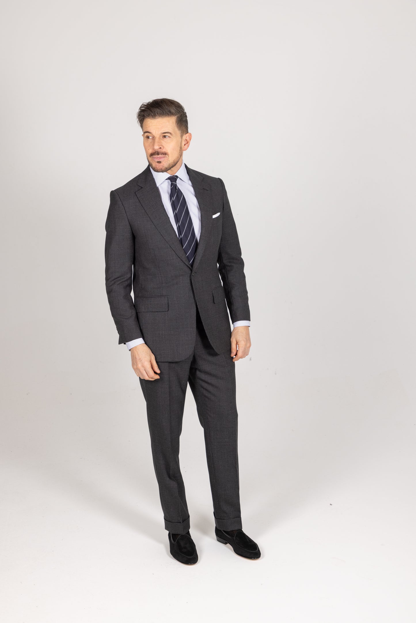 
                  
                    Single Breatsed Notch Suit in Charcoal Check Wool
                  
                
