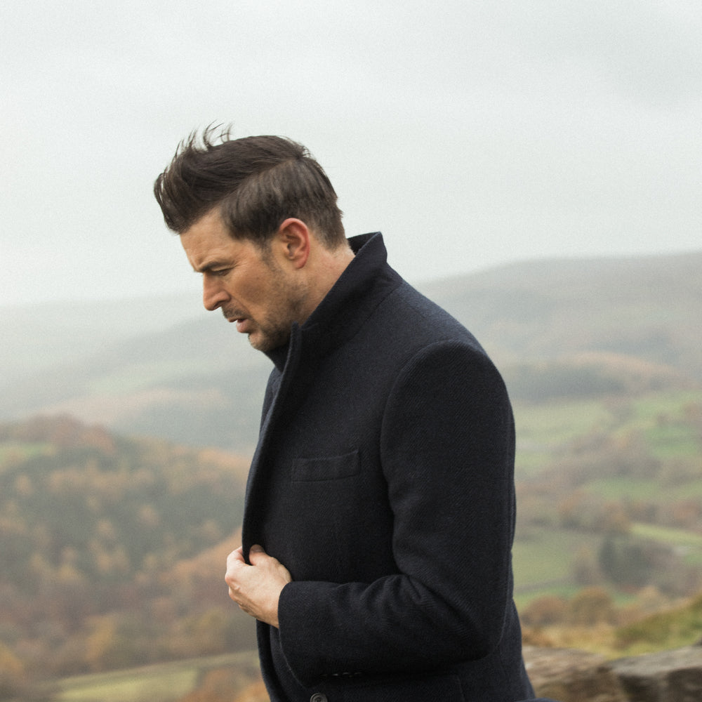 
                  
                    Double Breasted Peak Lapel Overcoat in Navy Herringbone
                  
                