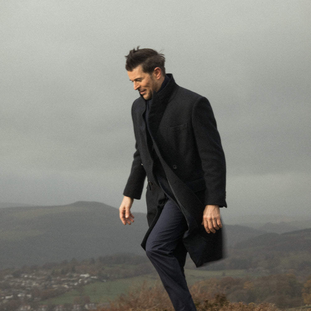 
                  
                    Double Breasted Peak Lapel Overcoat in Navy Herringbone
                  
                
