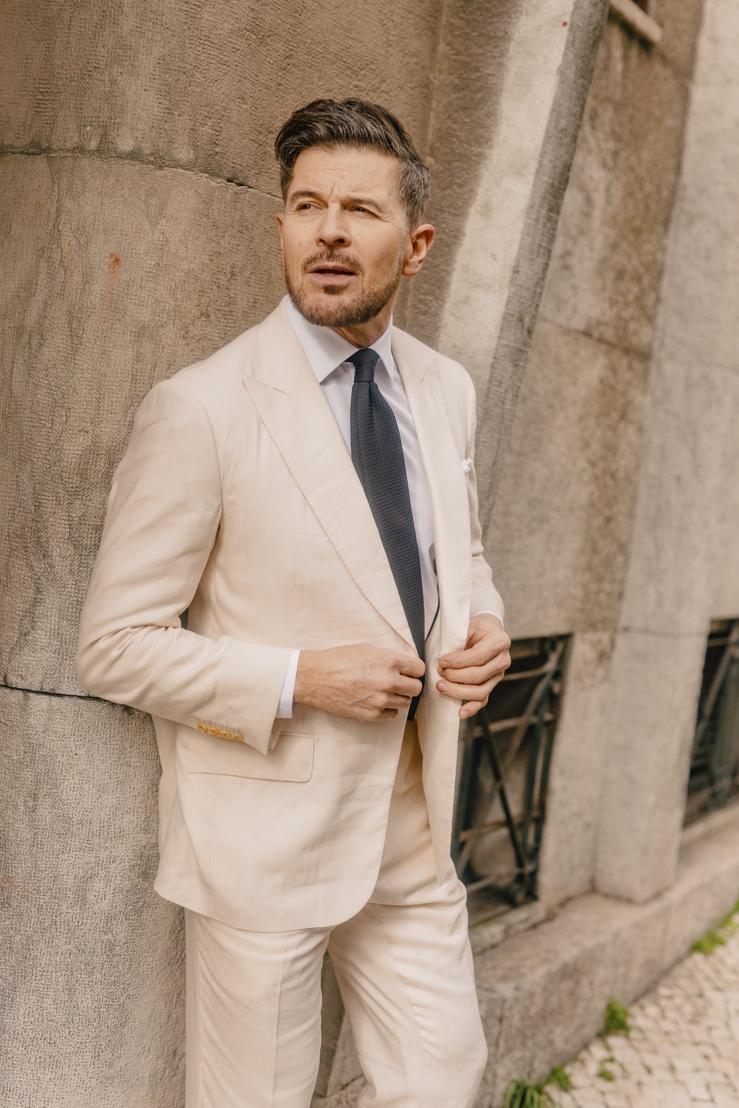 
                  
                    Single Breasted Peak Lapel Suit in Cream Wool Linen
                  
                