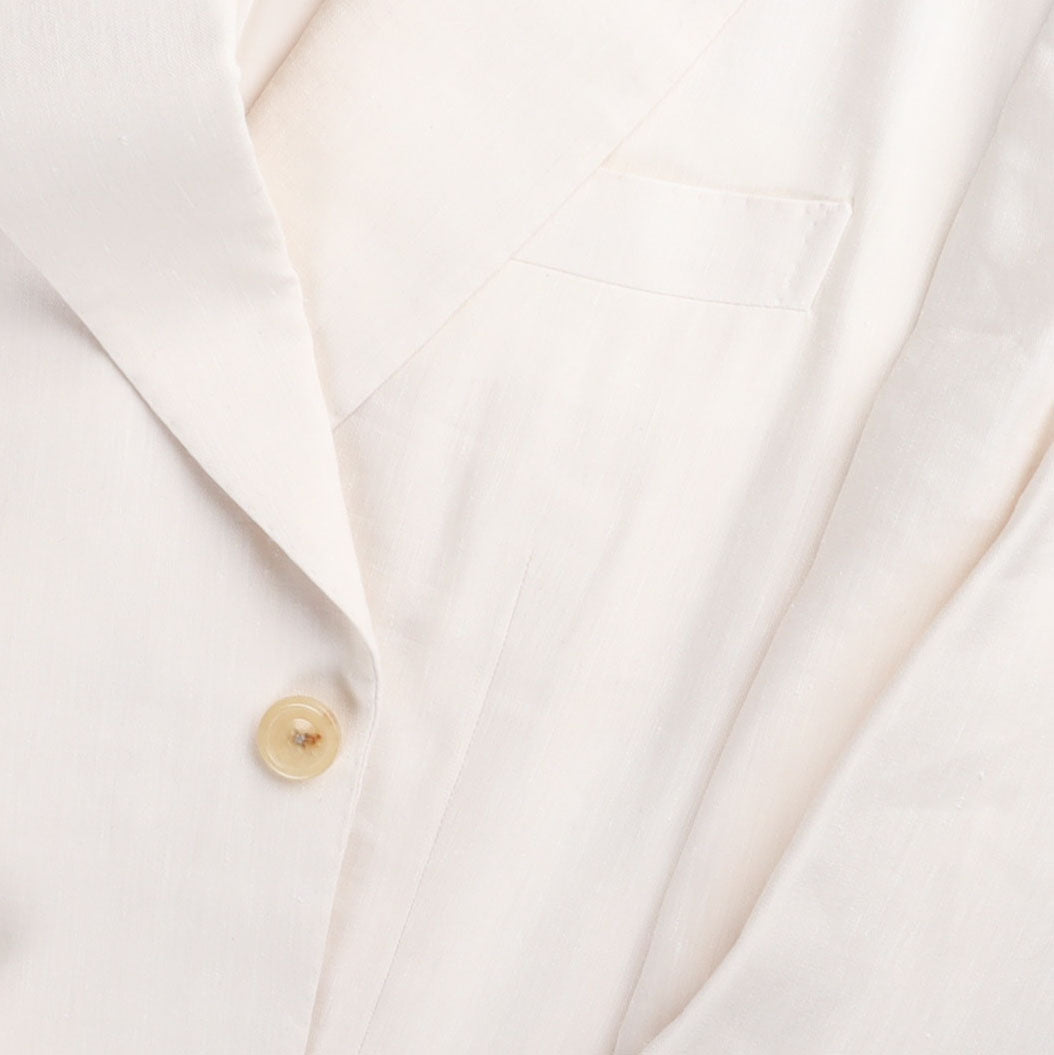 
                  
                    Single Breasted Peak Lapel Suit in Cream Wool Linen
                  
                