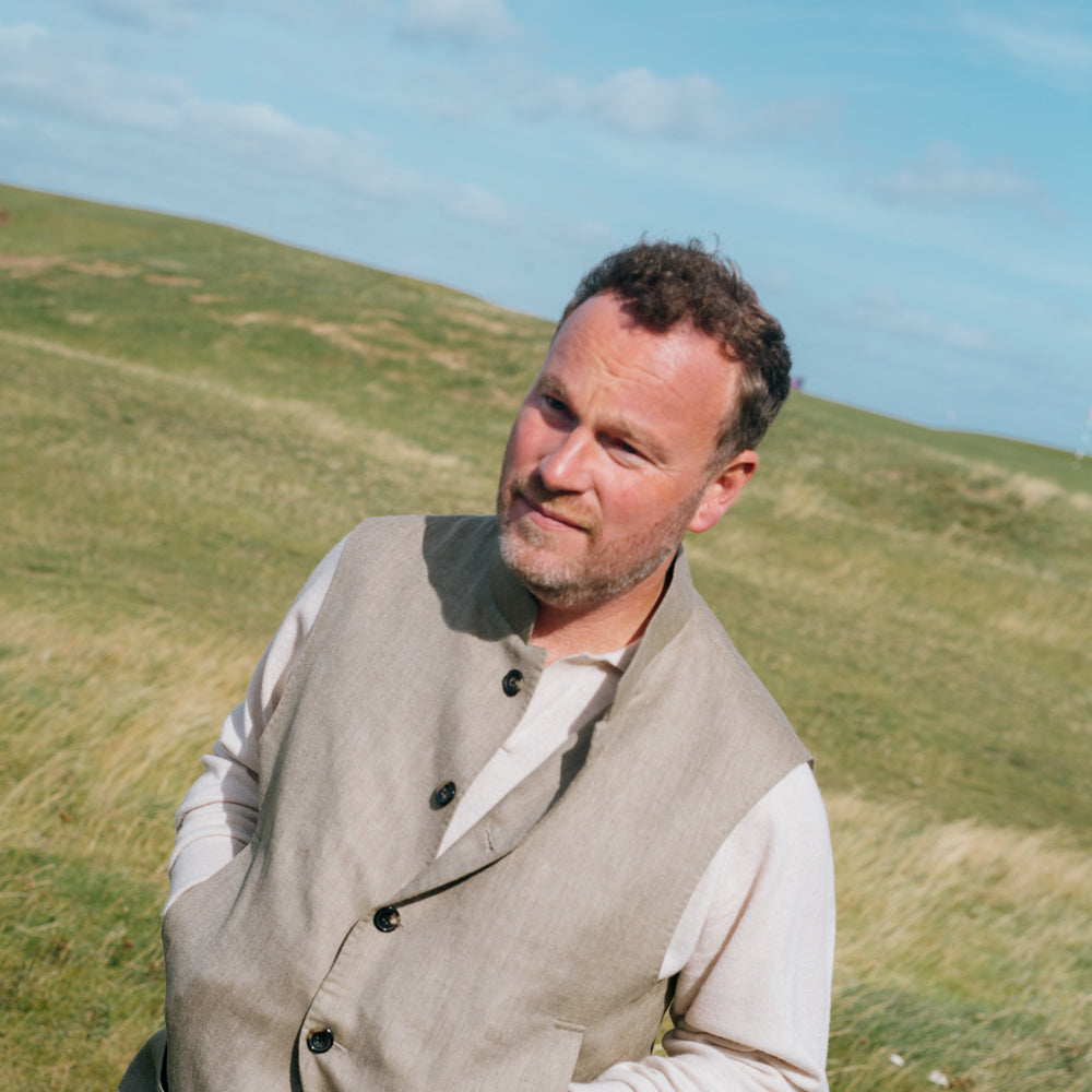 
                  
                    Polo Neck Jumper in Cedar
                  
                