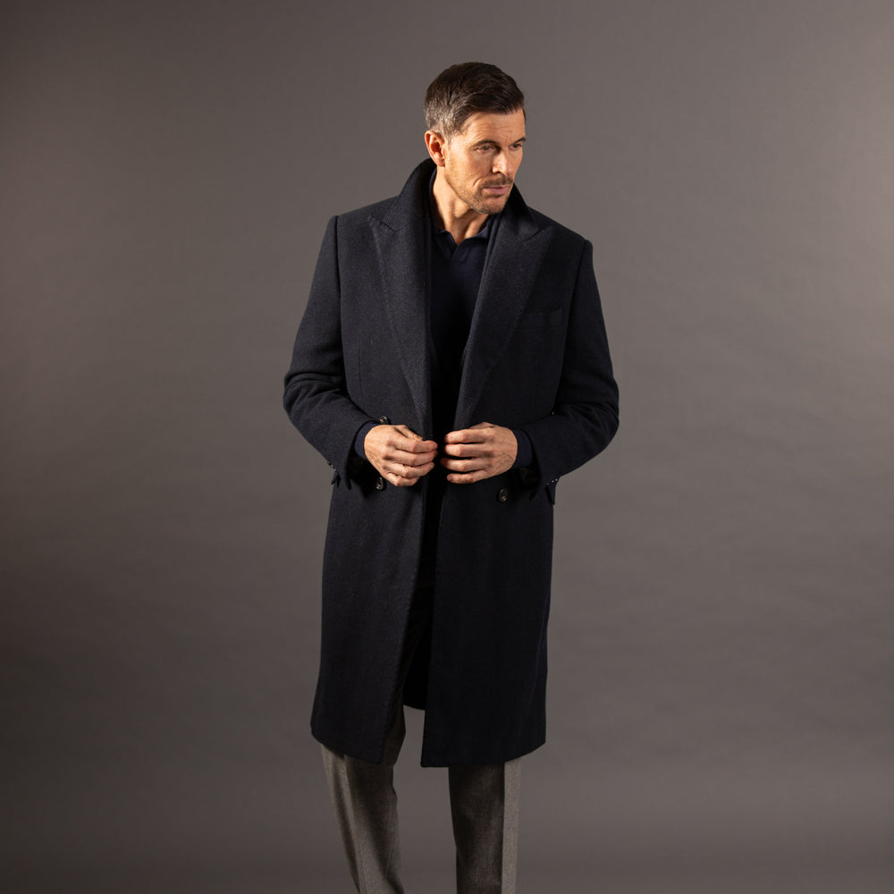 
                  
                    Double Breasted Peak Lapel Overcoat in Navy Herringbone
                  
                