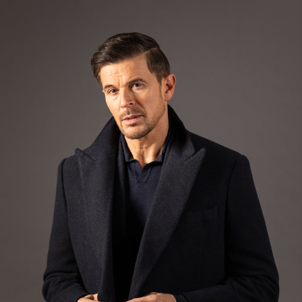 
                  
                    Double Breasted Peak Lapel Overcoat in Navy Herringbone
                  
                