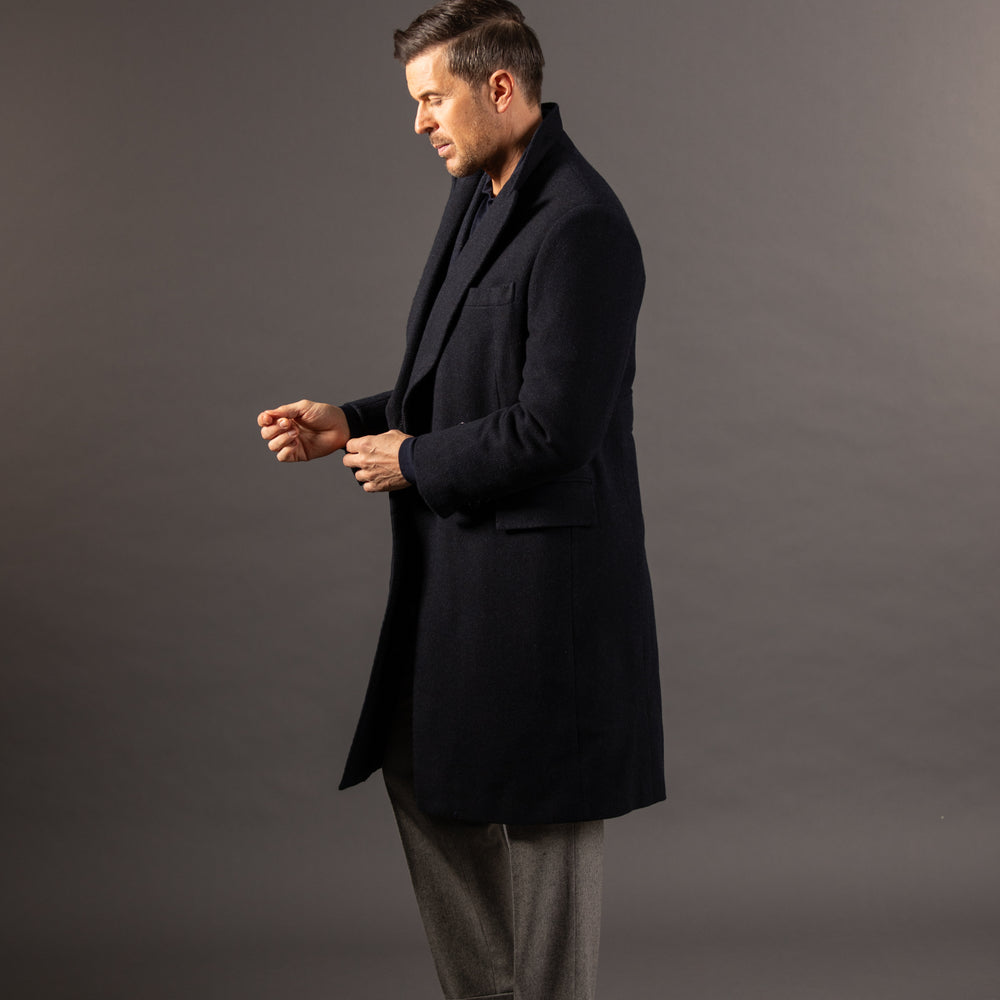 
                  
                    Double Breasted Peak Lapel Overcoat in Navy Herringbone
                  
                