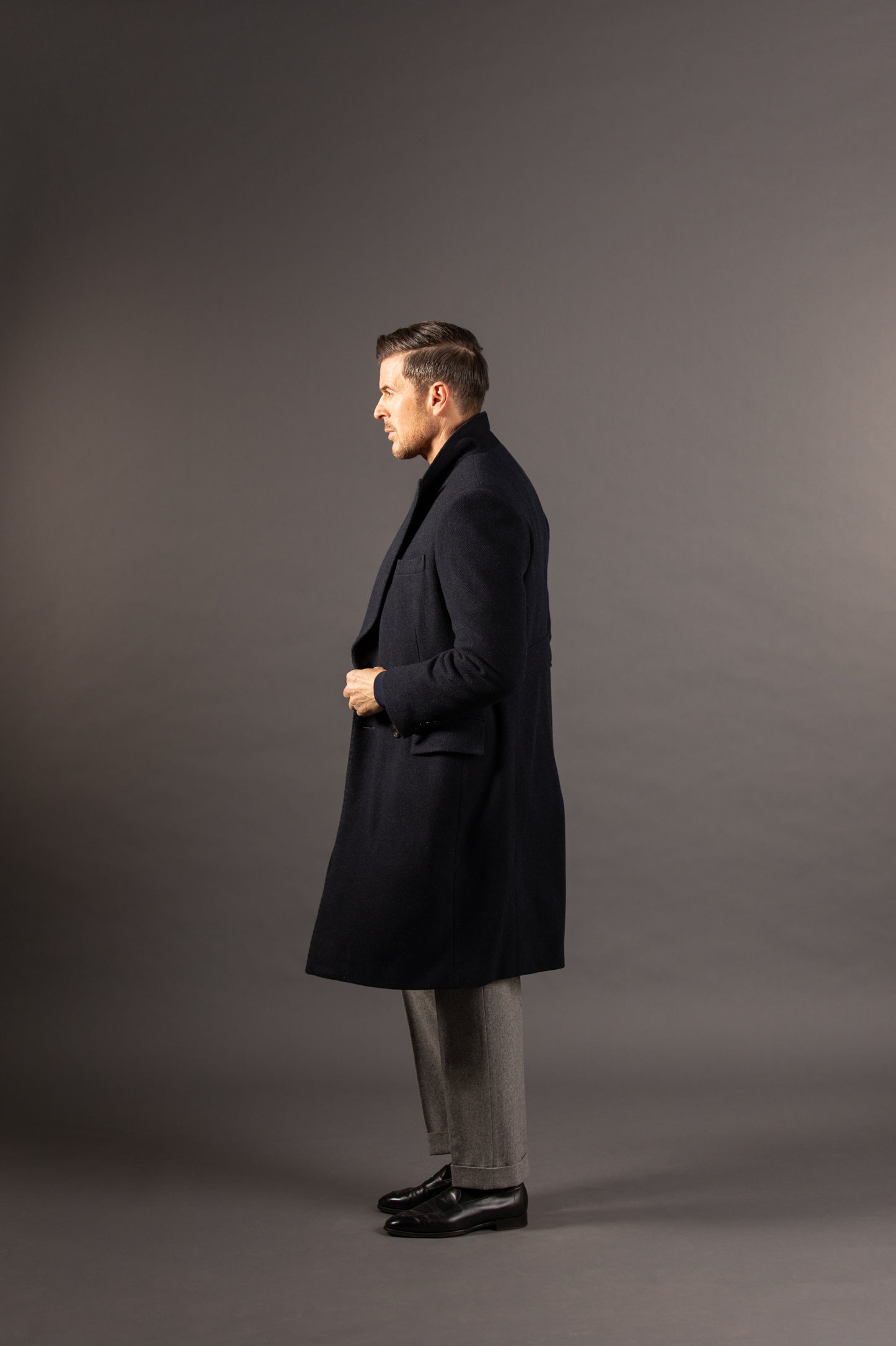 
                  
                    Double Breasted Peak Lapel Overcoat in Navy Herringbone
                  
                