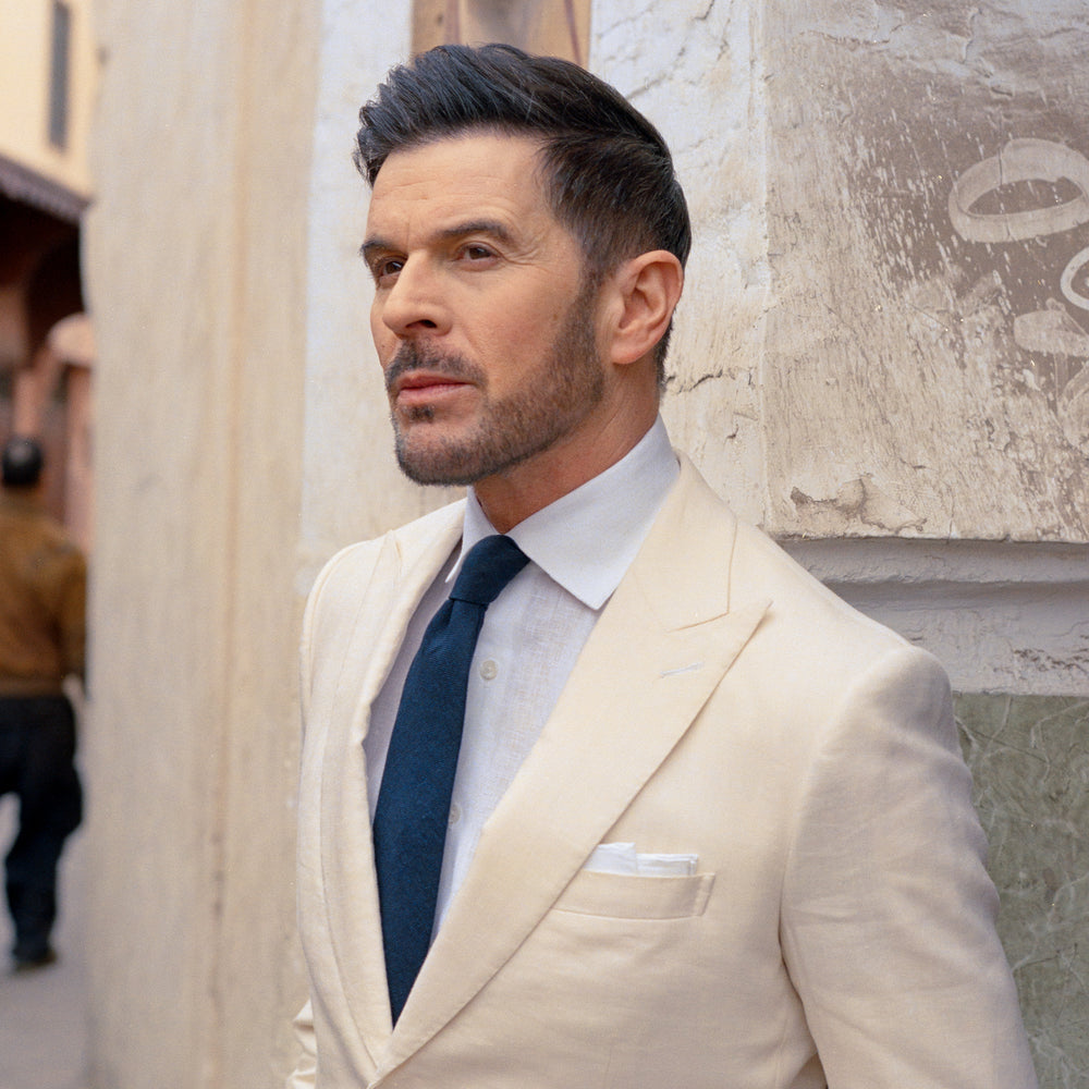 
                  
                    Single Breasted Peak Lapel Suit in Cream Wool Linen
                  
                