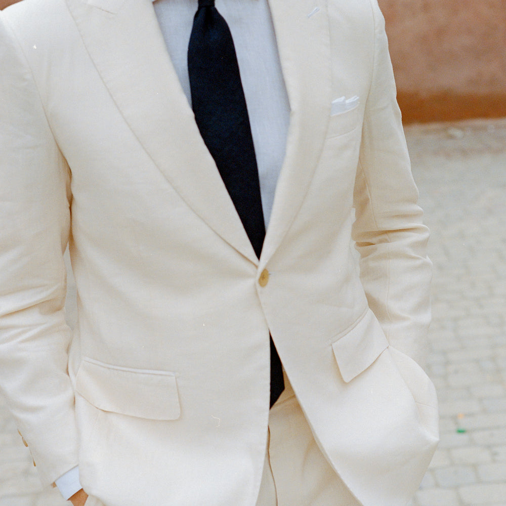 
                  
                    Single Breasted Peak Lapel Suit in Cream Wool Linen
                  
                