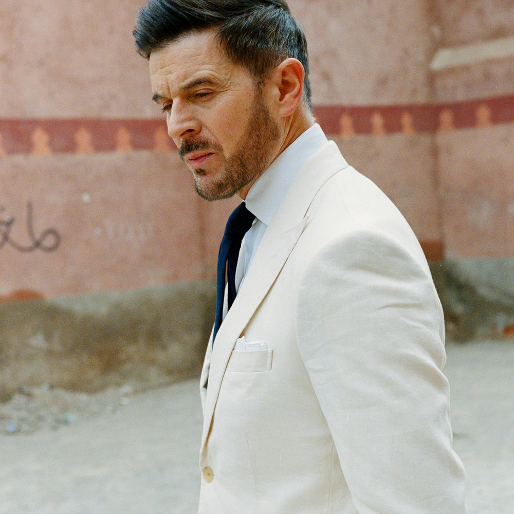
                  
                    Single Breasted Peak Lapel Suit in Cream Wool Linen
                  
                