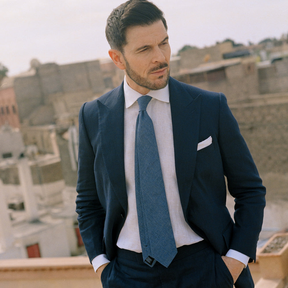 
                  
                    Single Breasted Peak Lapel Suit in Navy Wool Linen
                  
                