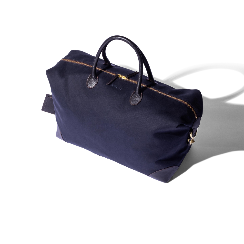 
                  
                    Weekend Bag in Blue Canvas
                  
                